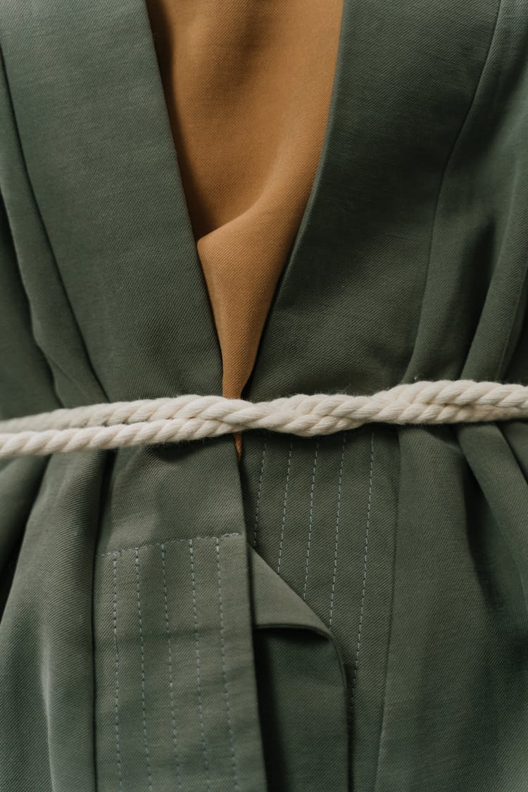 Close-up Of Person Being Tied With A Rope 