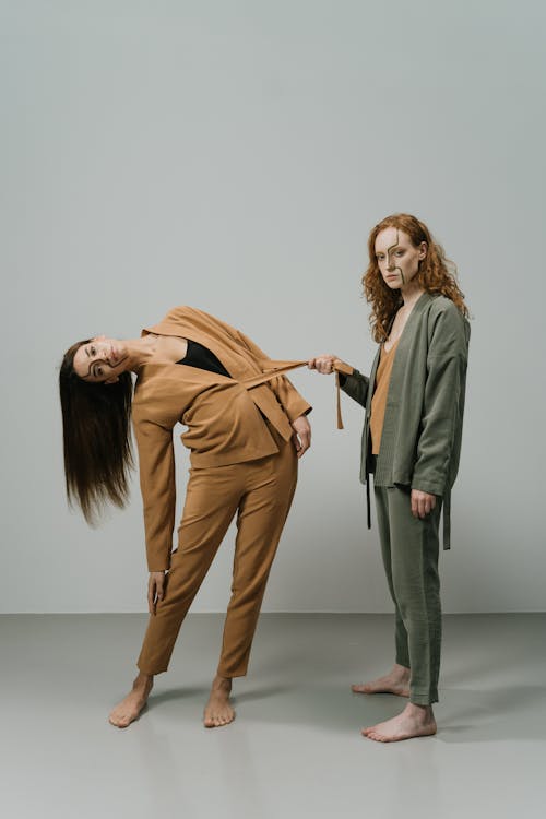 Women Posing in Suits 