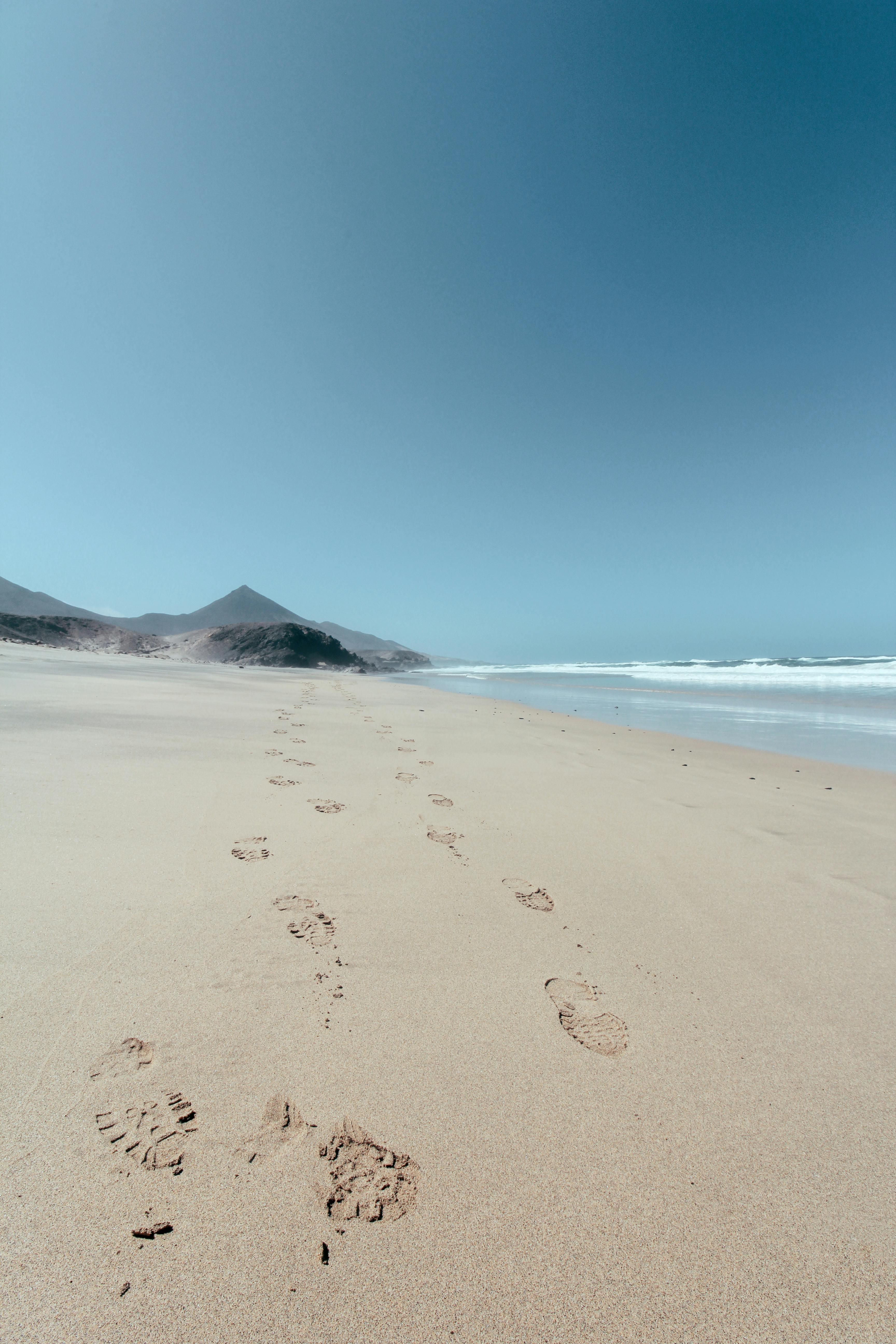 Traces of the human foot, footsteps of people, route from footprints.  Wallpaper for banner, poster footprint Stock Photo - Alamy