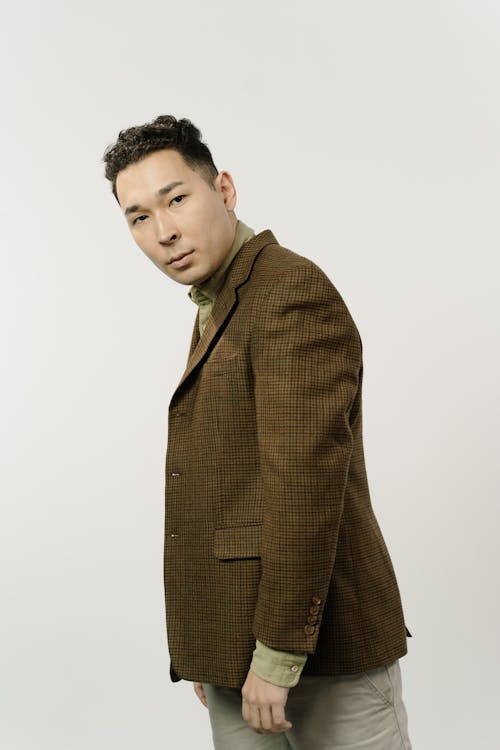 A Man in Brown Suit Jacket