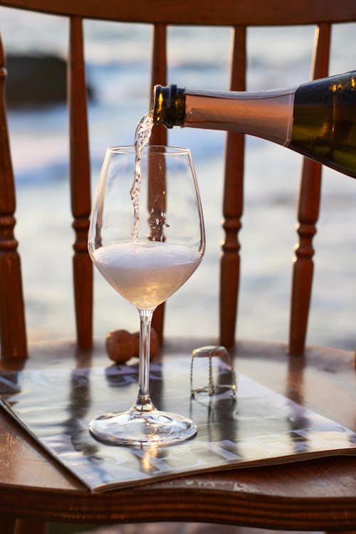 Photograph of Champagne Being Poured into a Glass