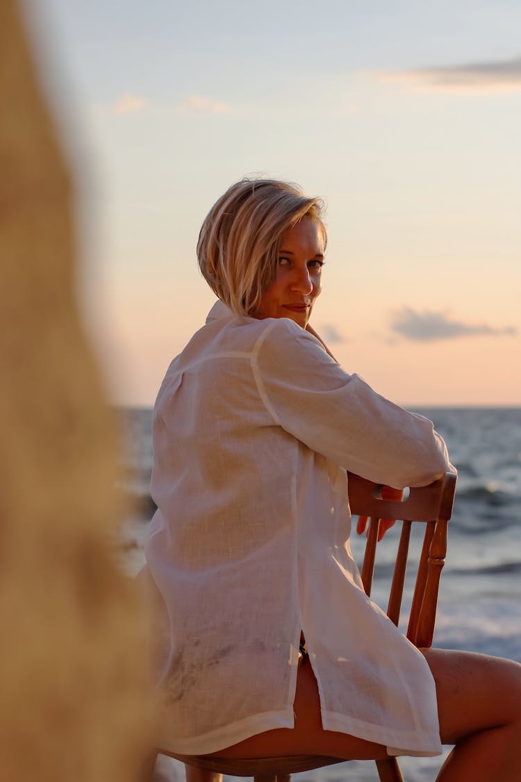 Woman In Shirt Posing At Dusk