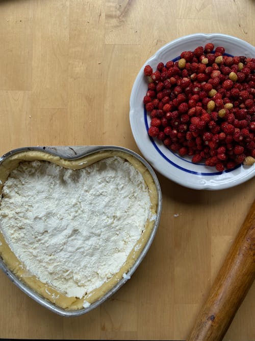 Berries Besides a Heart Shape Dough