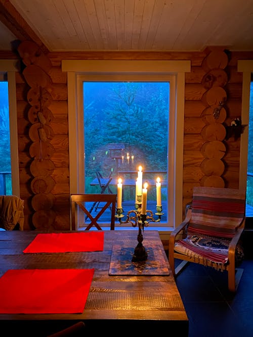 A Candles with Candle Holder on a Table 