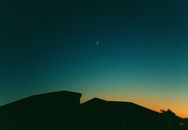 Silhouette of House Under Blue Sky during Night Time