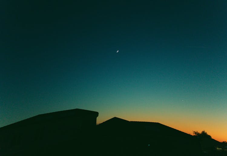 Crescent Moon On Blue Sky