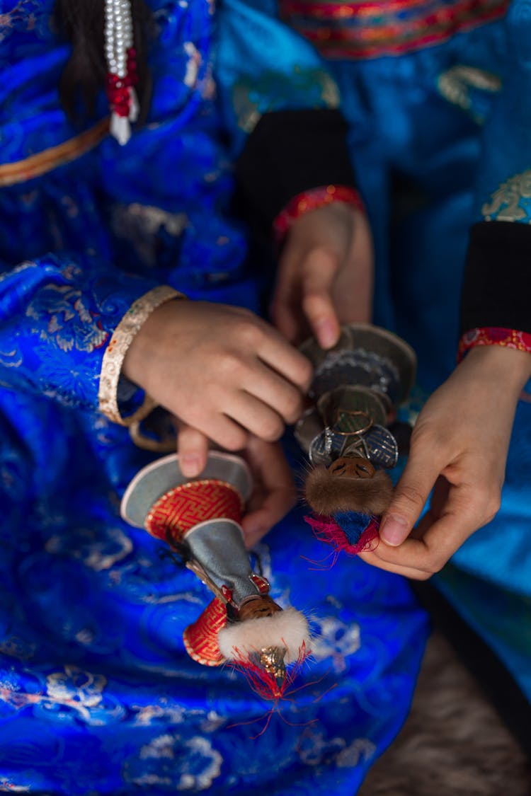 People Playing With Dolls