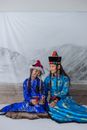 A Mother and Daughter in Their Buryats Dress