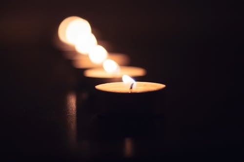 Row of Lighted Tealight Candles