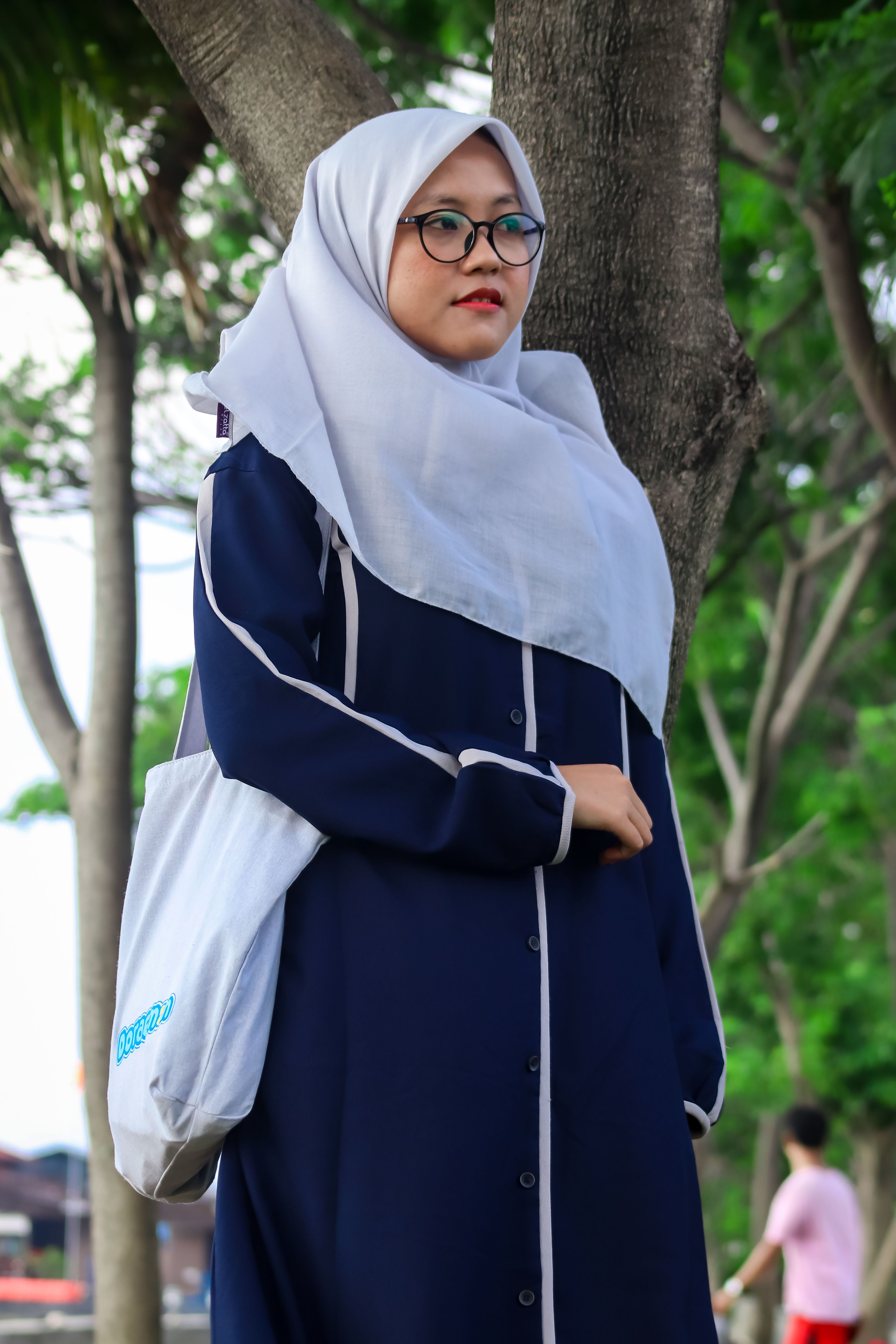 Woman in White Hijab Standing Beside Tree · Free Stock Photo