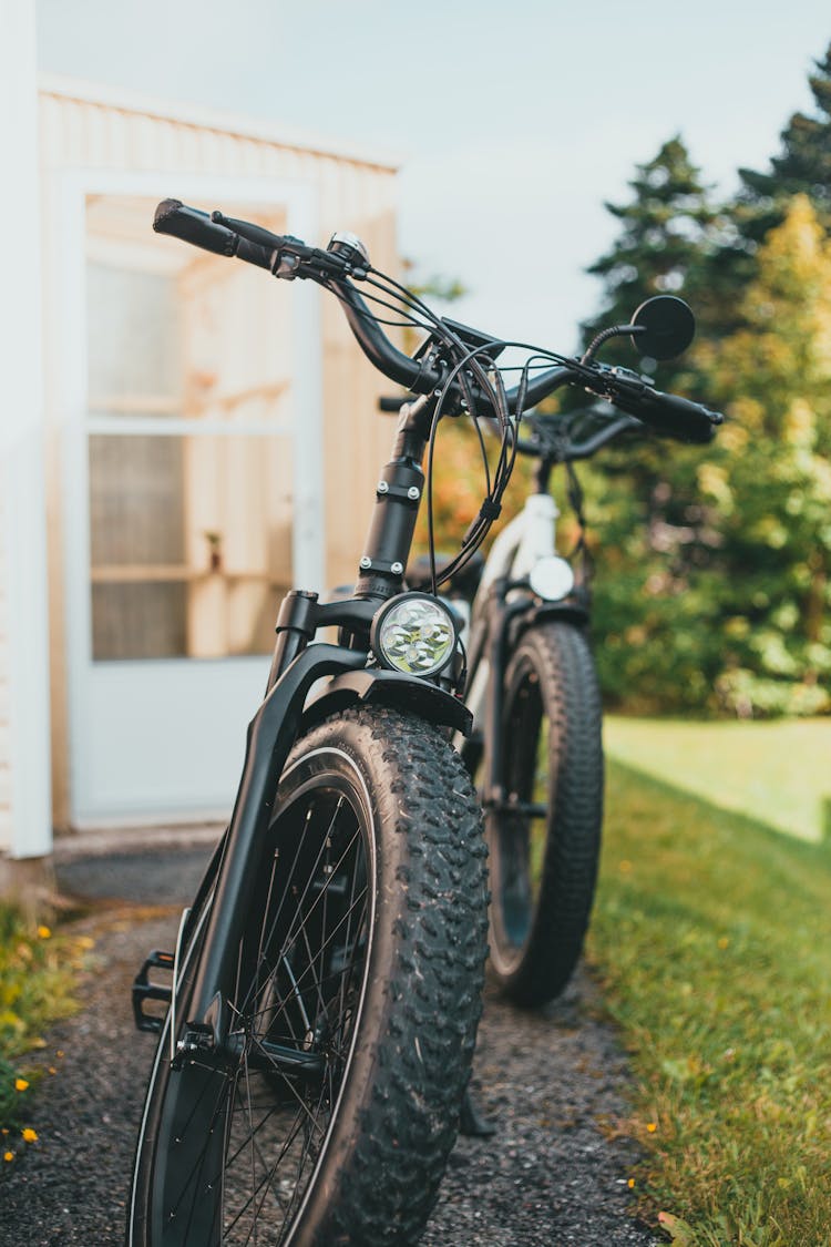 Bicycles On Pathway Outside Building