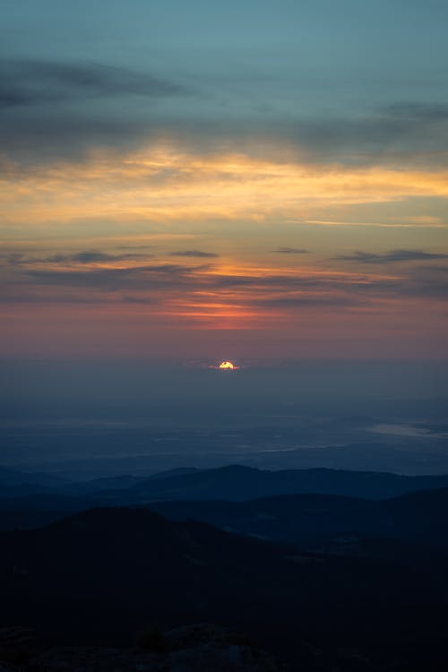 Landscape with Sunset in Mountains