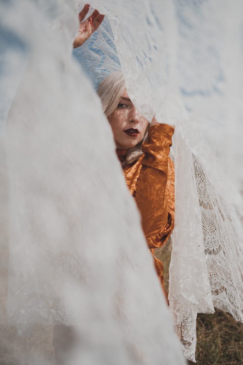 Free Woman Under a White Cloth Stock Photo