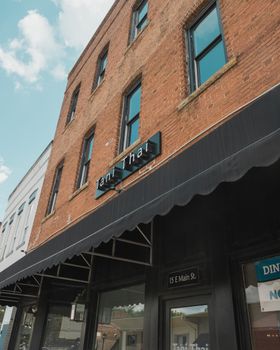 Tani Thai restaurant facade showcasing urban architecture on E Main St in Buford, Georgia.