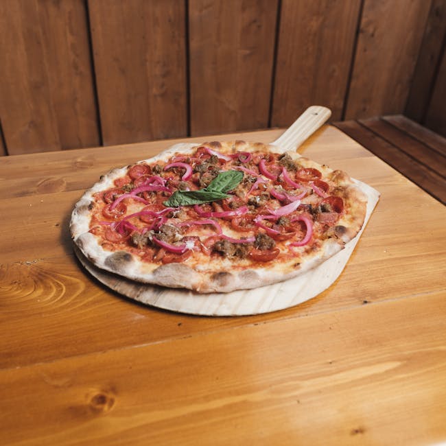 Close-up of a delicious pizza with toppings on a wooden table, Orlando, FL.
