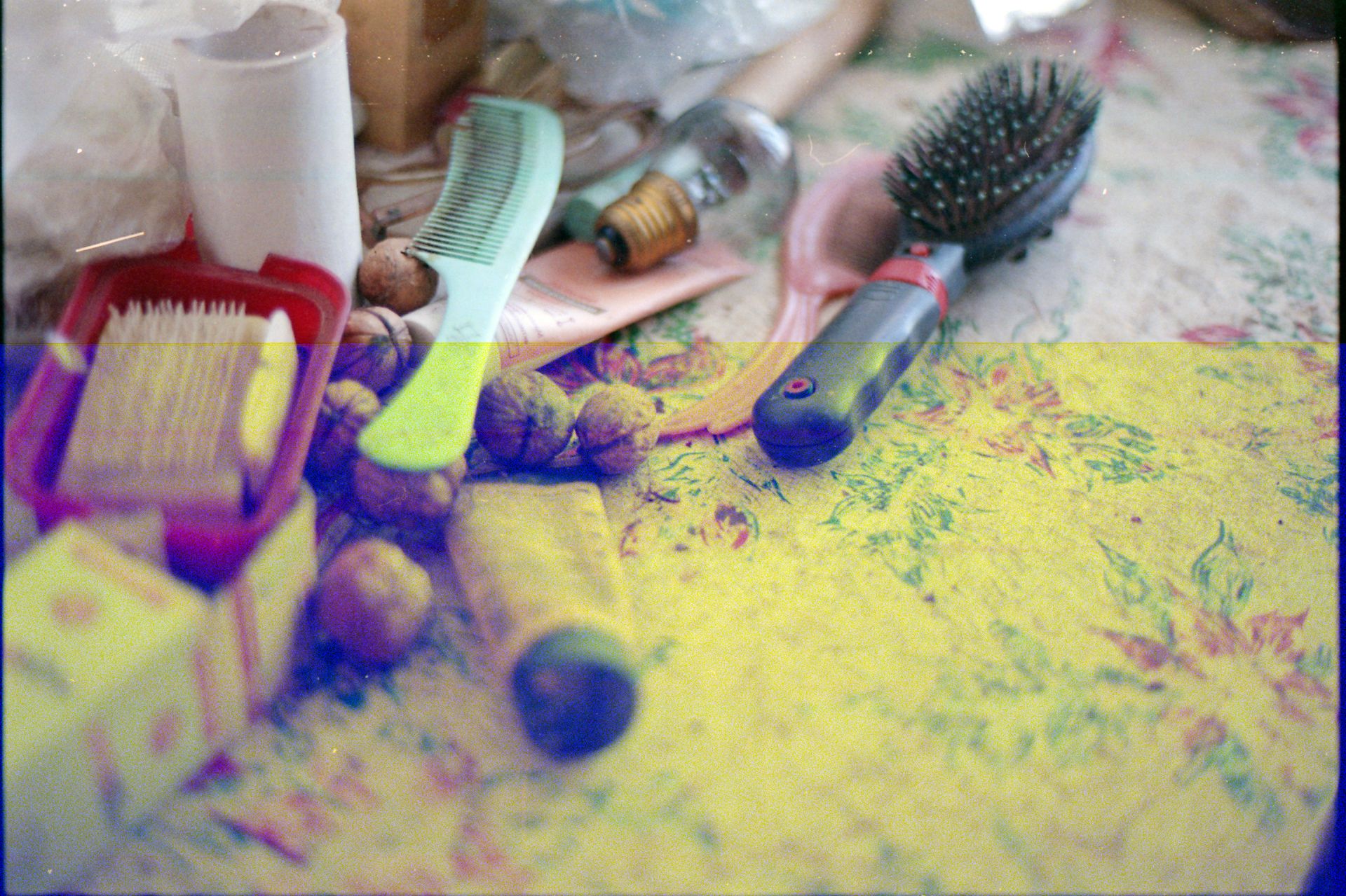A Light Bulb Between a Dirty Comb and a Hair Brush