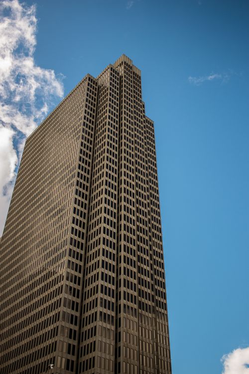Free Iconic One Embarcadero Center tower in San Francisco, California, set against a clear blue sky. Stock Photo
