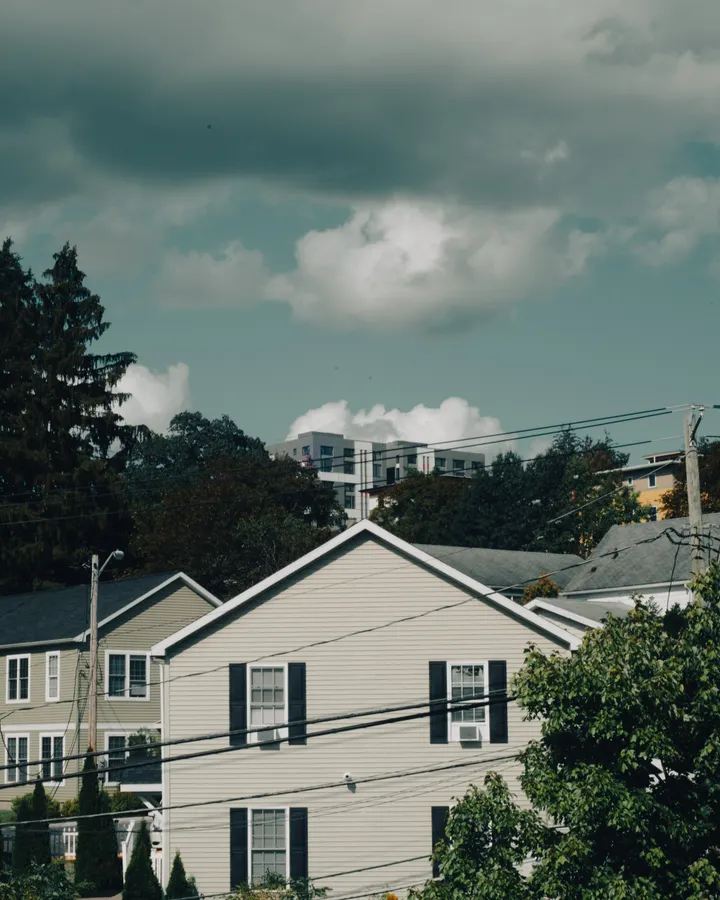 Refrigerator repair in Allied Gardens, CA Suburban houses under a cloudy sky in a quiet residential area, like the streets of Allied Gardens