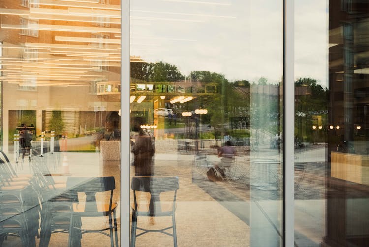 Reflection Of Cafe In Window