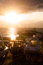 A Watercrafts on the Beach During Sunset