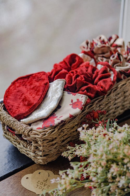 A Basket of Assorted Handmade Face Masks and Scrunchies