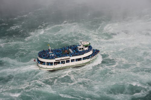 Tourists Riding the Maid of the Mist Boat in Niagara Falls