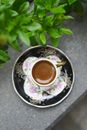 White and Purple Floral Ceramic Cup With Saucer