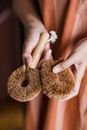 Close-Up Photo of a Person Holding a Brown Body Brush