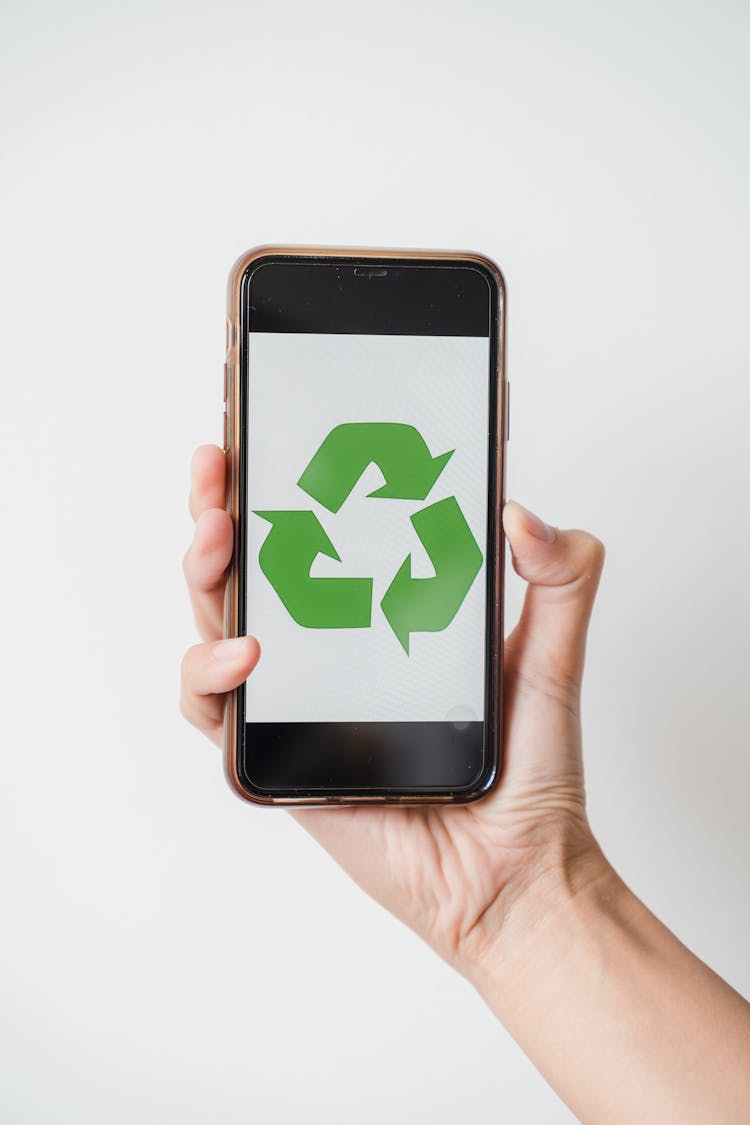 Close-Up Shot Of A Person Showing A Zero Waste Signage In A Smartphone