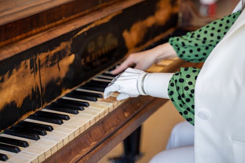 Person with Prosthetic Hand Playing the Piano