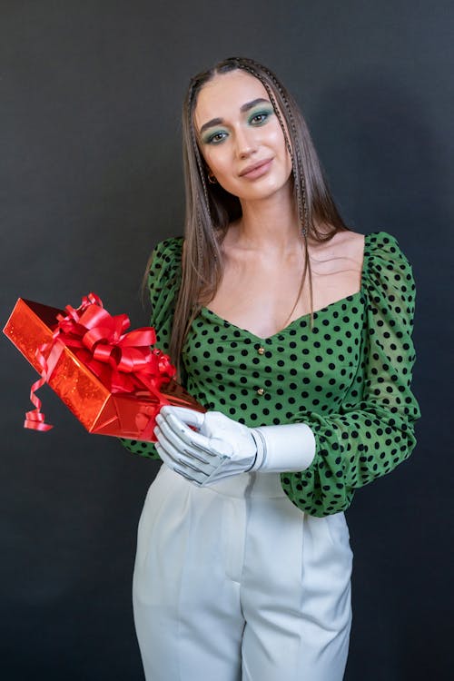 Brunette Woman Holding a Gift 