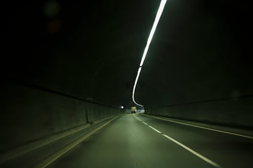 Gray Asphalt Road during Night Time