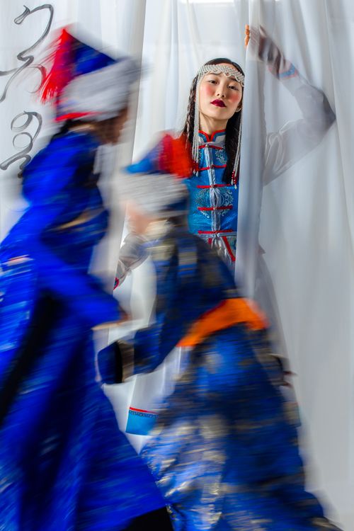 Free Dynamic capture of traditional Mongolian dancers in vivid costumes, showcasing cultural heritage. Stock Photo