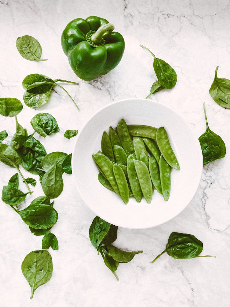 Green Vegetable On White Ceramic Plate