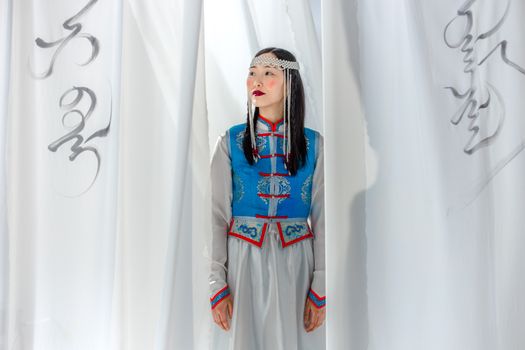 Woman in Traditional Clothes Looking Sideways