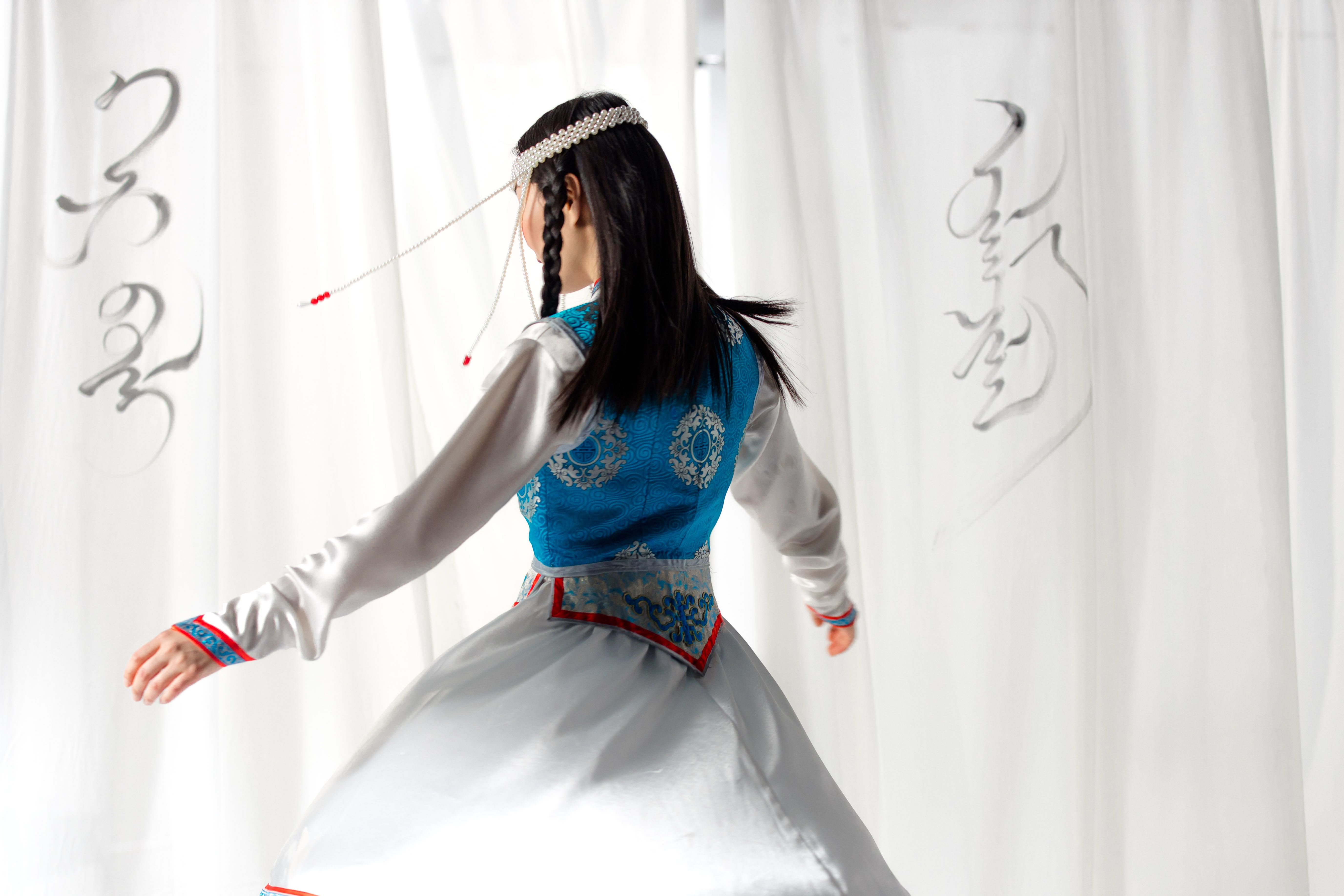 A Woman in Traditional Mongolian Clothing · Free Stock Photo