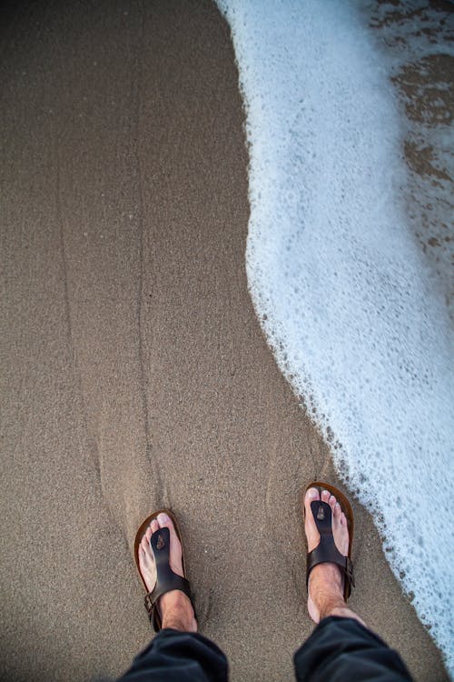 Photography of a Person Wearing Sandals · Free Stock Photo