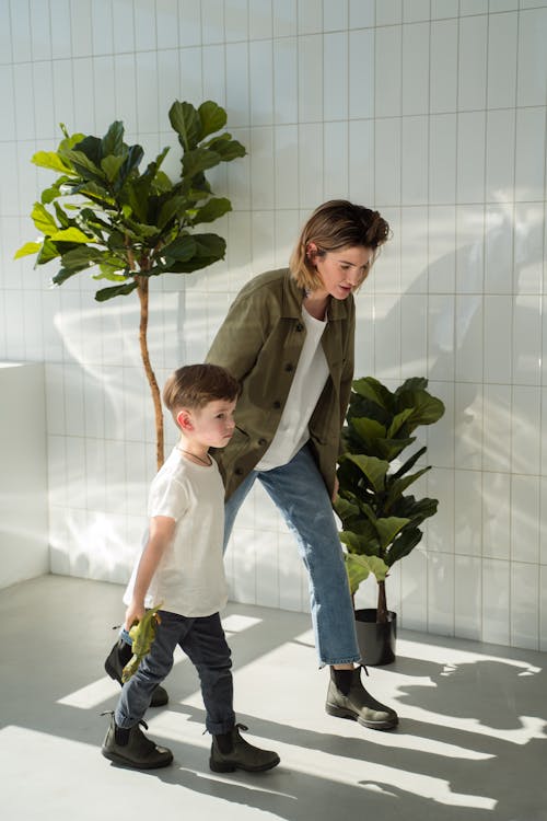 A Woman Walking with her Son