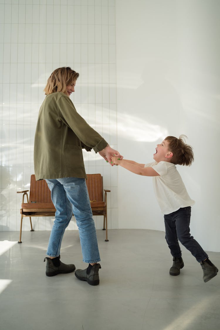 A Woman Playing With Her Son 