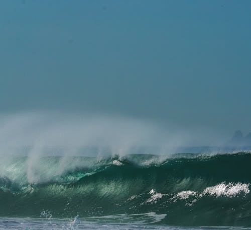 Big Ocean Waves Under Blue Sky