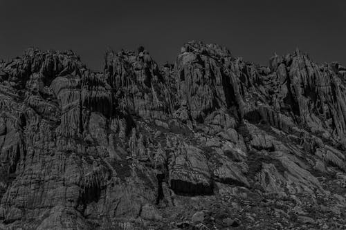 Grayscale Photo of a Rocky Mountain