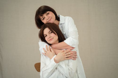 Mother Embracing Her Daughter from Behind