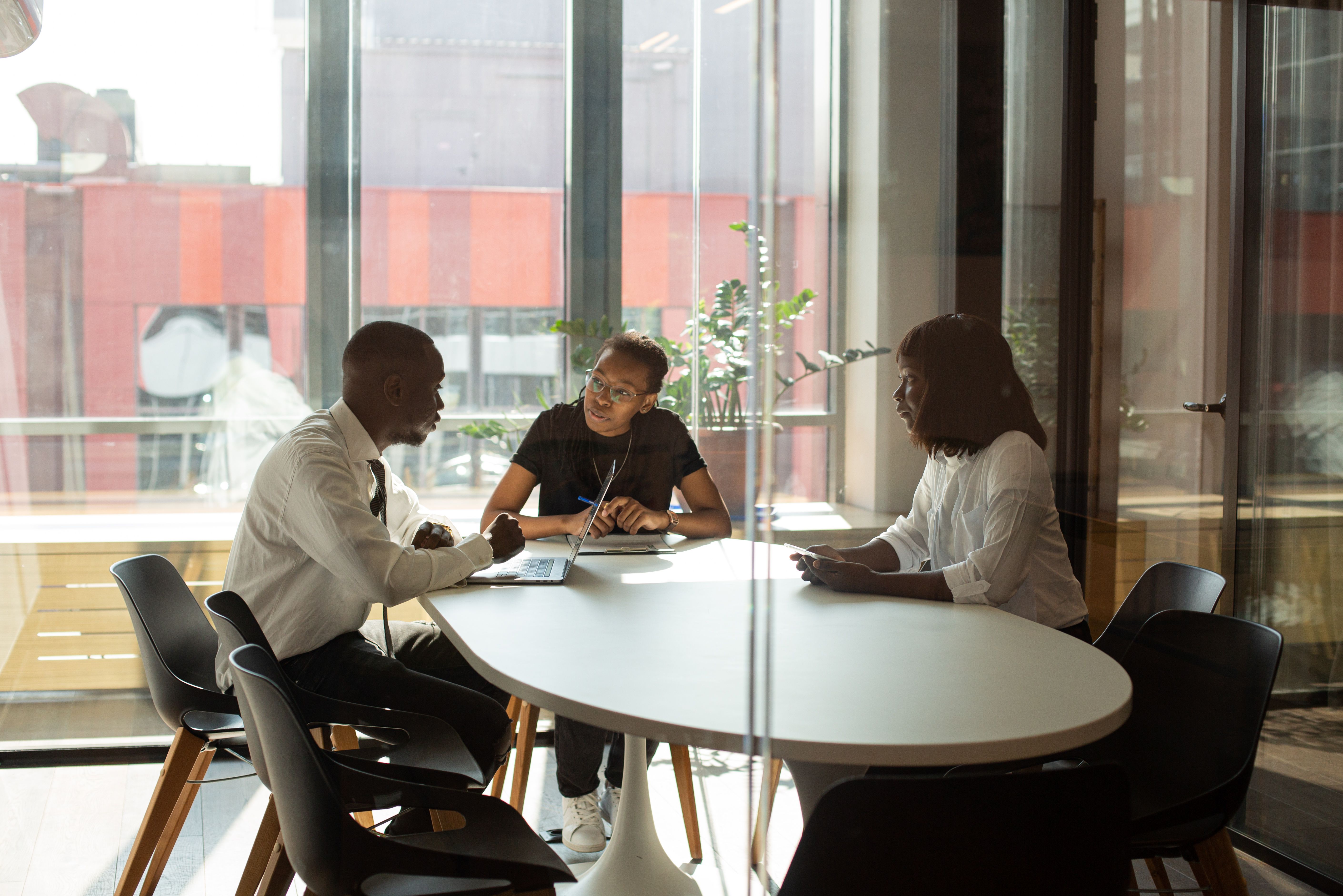 Coworkers having a Huddle · Free Stock Photo