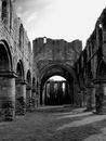 Grayscale Photo of Brick Building