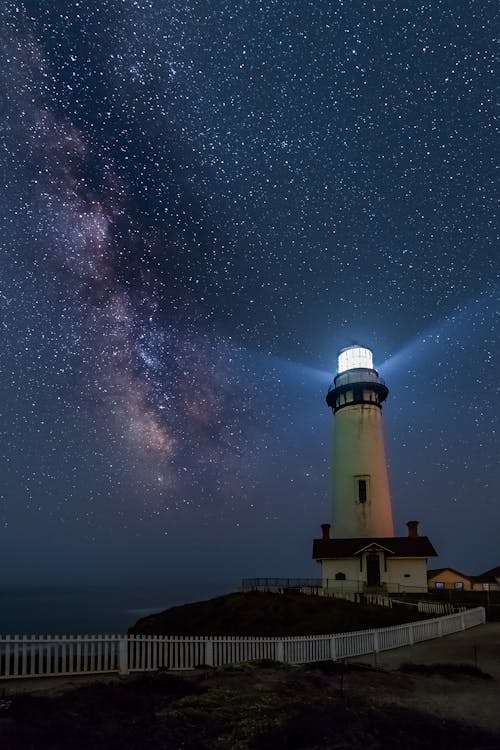 Lighthouse Tower Under Starry Night