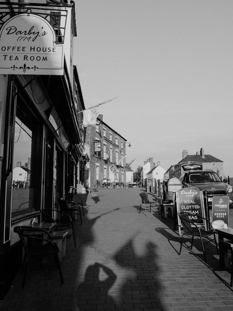 Cafe Chairs On Old City Street