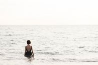 Woman in Black Bikini on Water