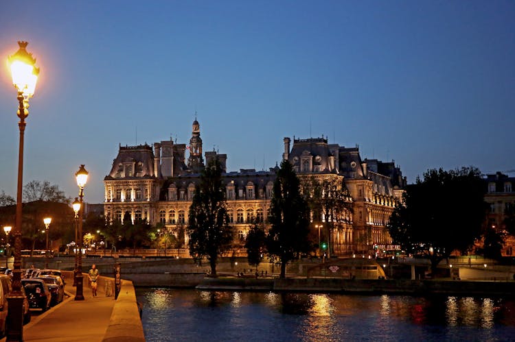 Canal Near Old City Building At Night