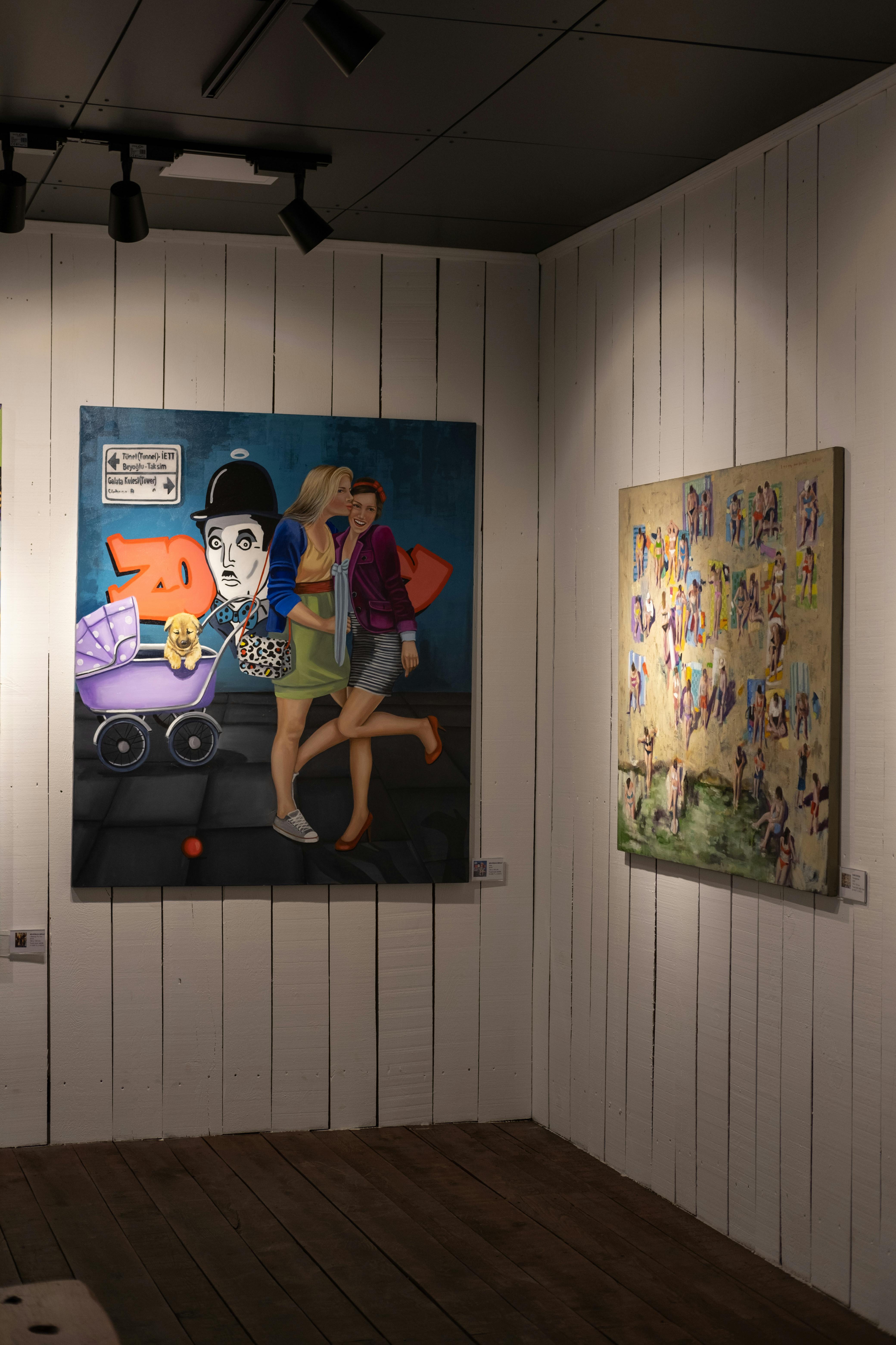 Art gallery showcasing contemporary paintings with vibrant colors and innovative designs.