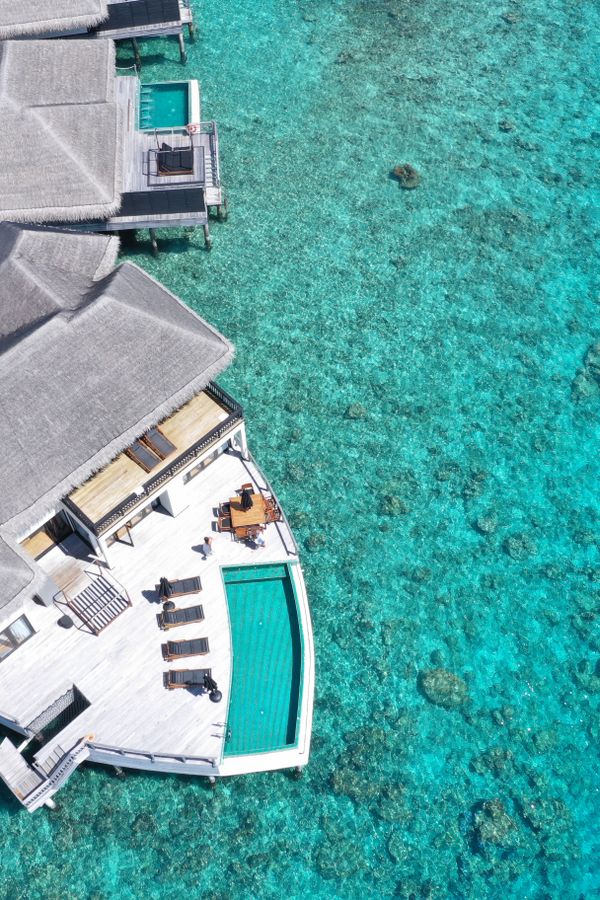 Maldives overwater villa aerial view